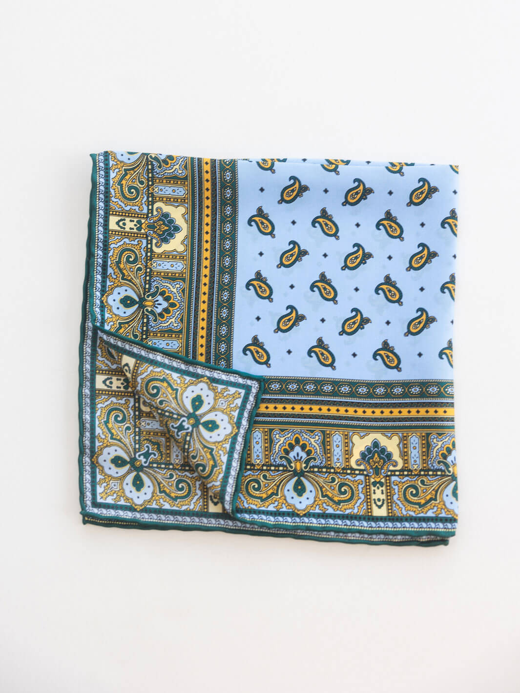 Light blue and gold silk paisley pocket square with hand-rolled edges