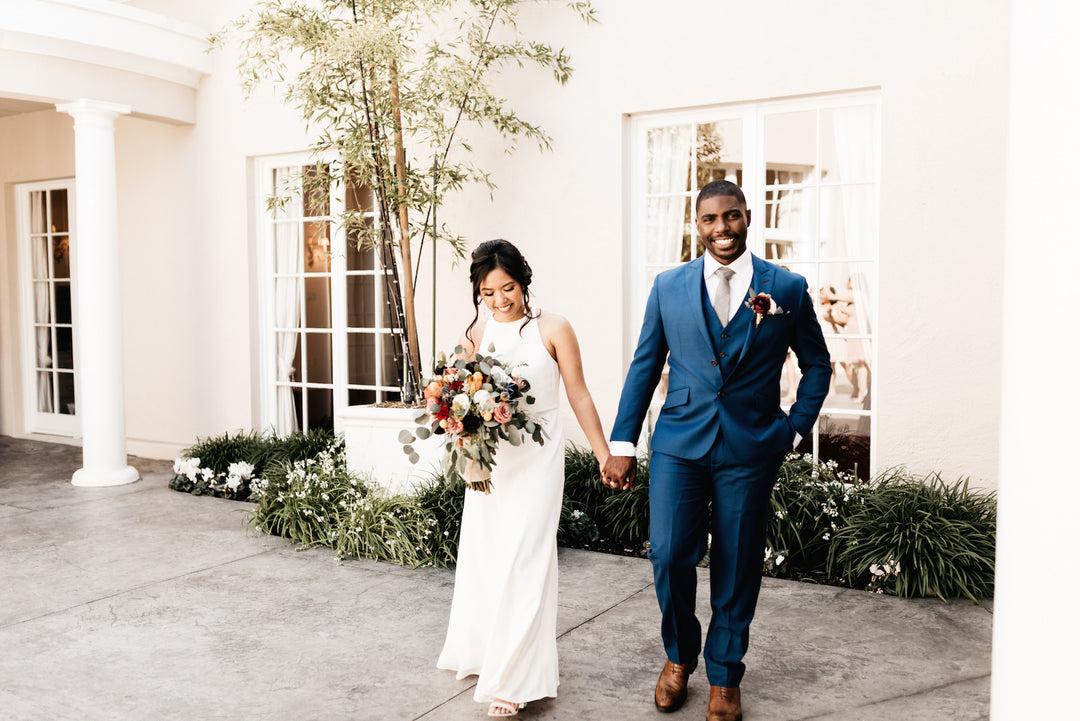 wedding couple holding hands