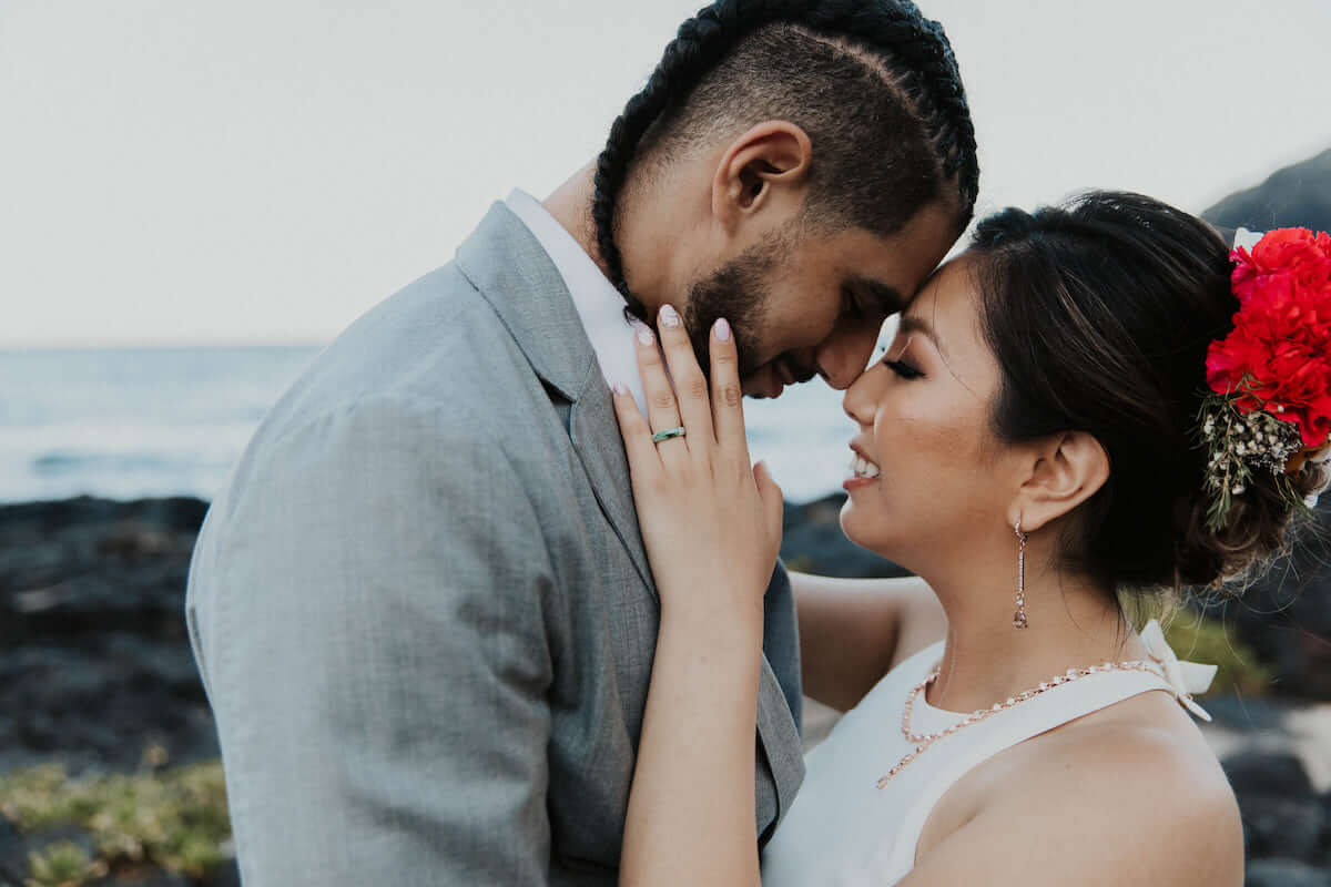 wedding couple gazing in each others' eyes